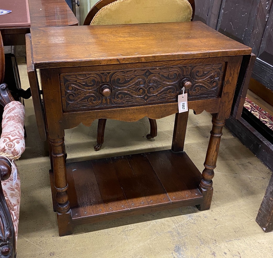 An 18th century style oak drop flap two tier side table, width 78cm, depth 42cm, height 77cm